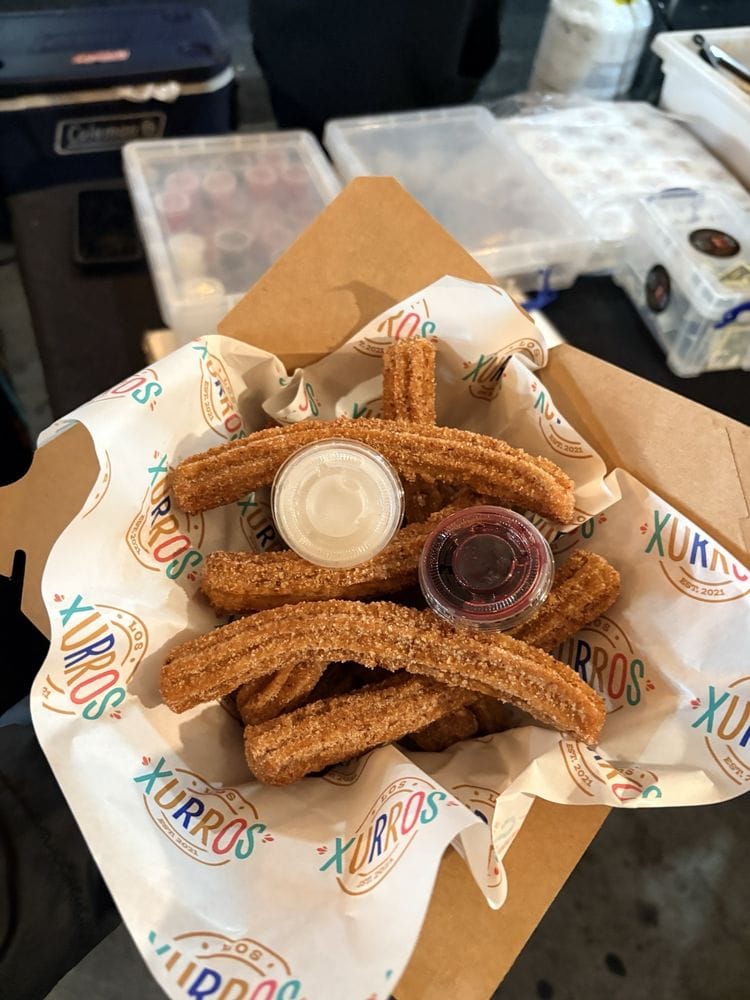 Los Xurros churros box with two dipping sauces